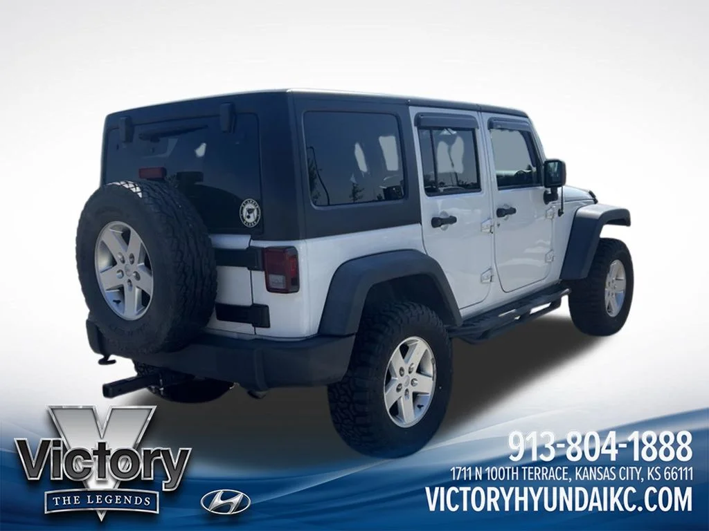 Used 2013 White Jeep Unlimited Sport image 5