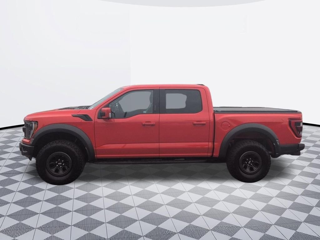 Used 2022 Orange Metallic Ford Raptor image 1
