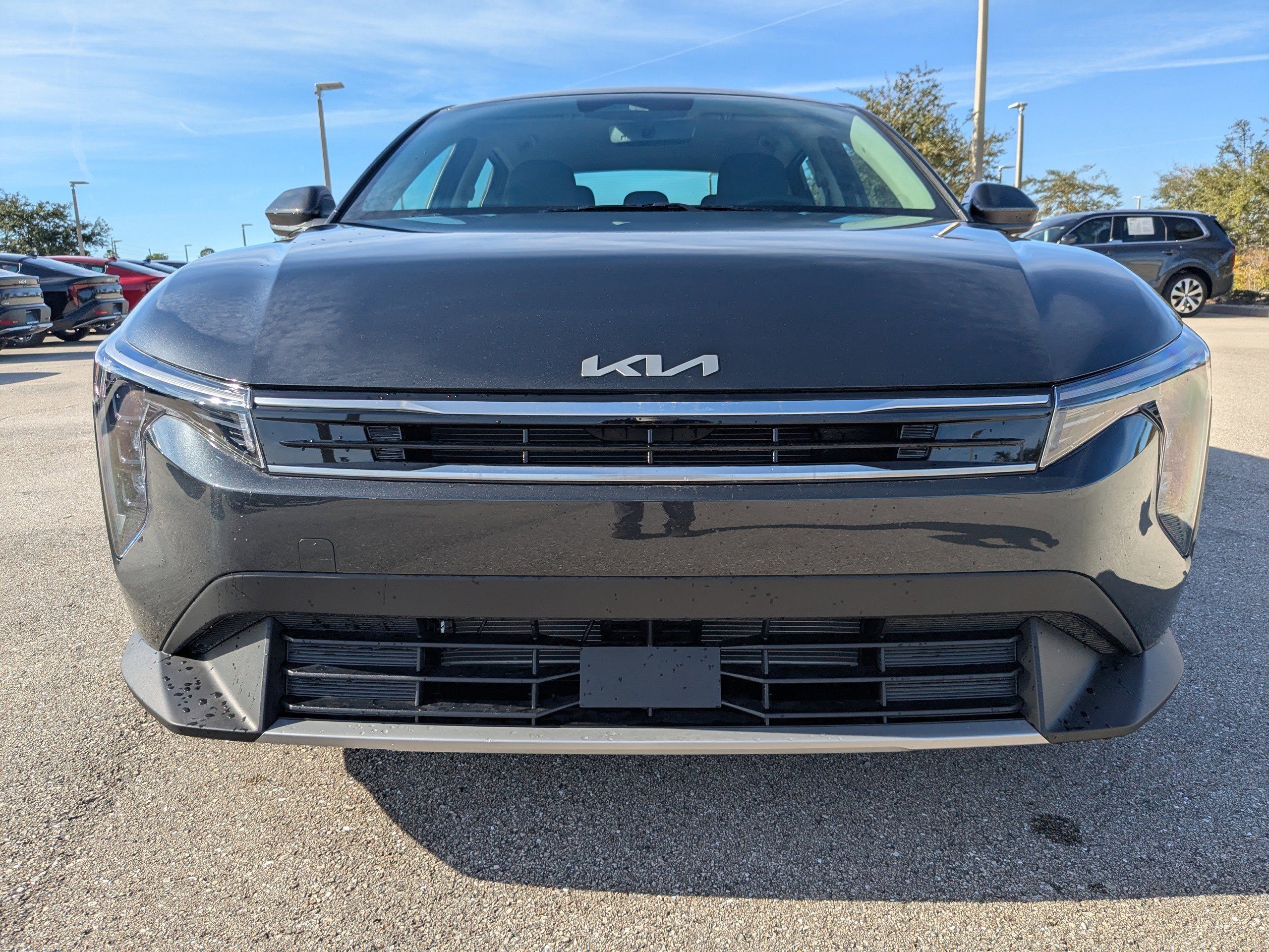 New 2025 Interstellar Gray Kia EX image 3