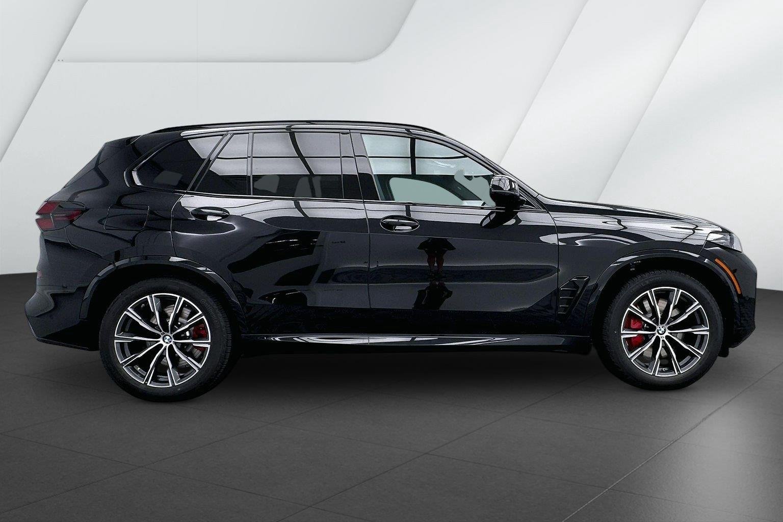 New 2026 Black Sapphire Metallic BMW xDrive50e image 5