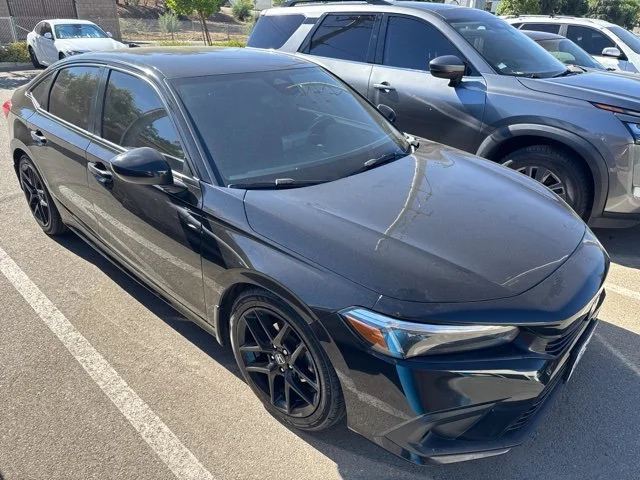 Used 2023 Crystal Black Pearl Honda Sport image 1