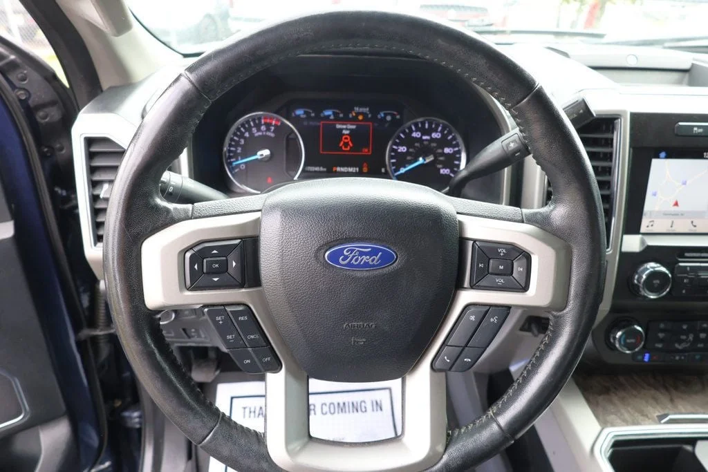 Used 2019 Blue Jeans Metallic Ford LARIAT 4WD Crew Cab 6.75