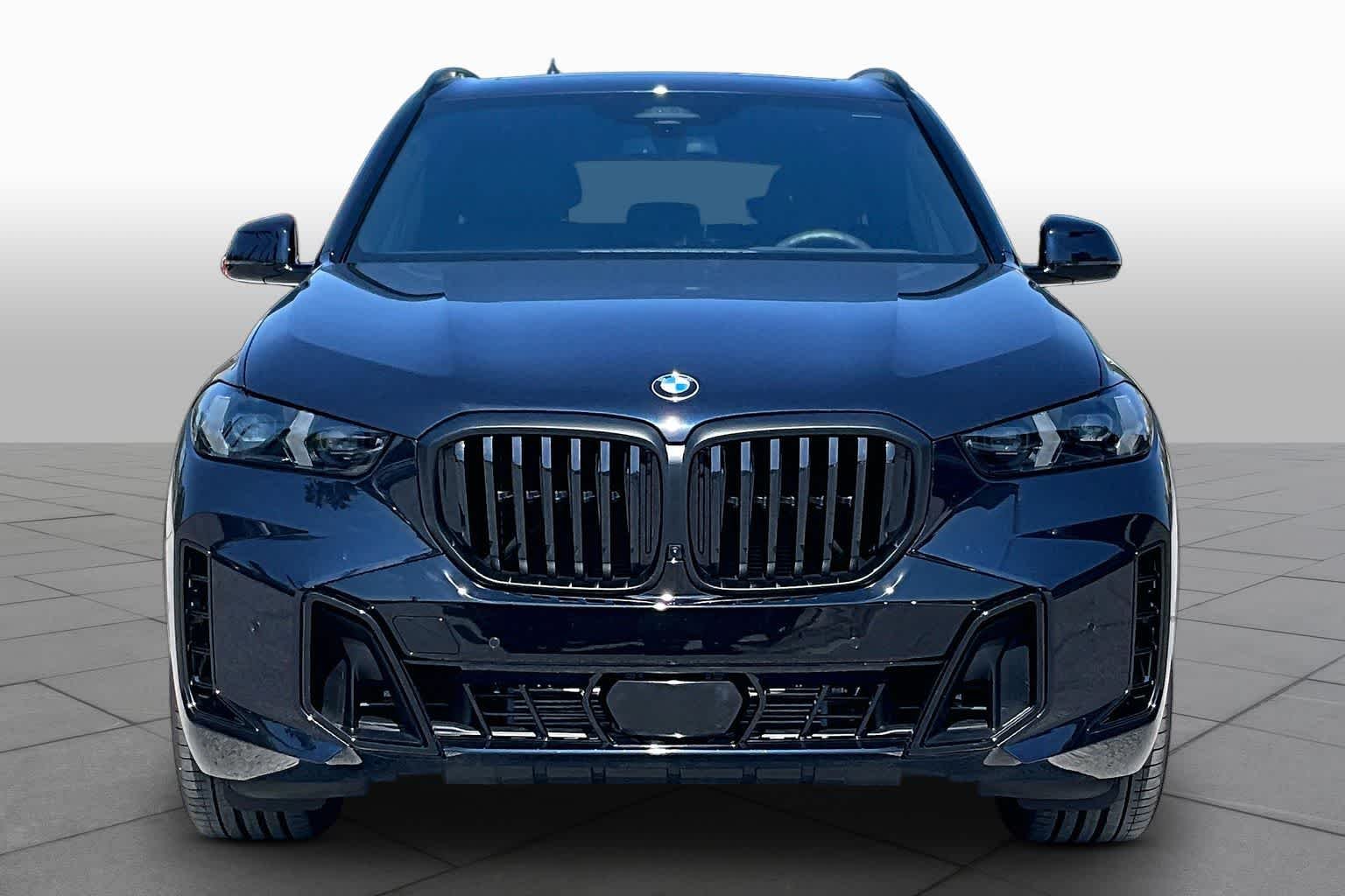 Used 2026 Black Sapphire Metallic BMW sDrive40i image 3