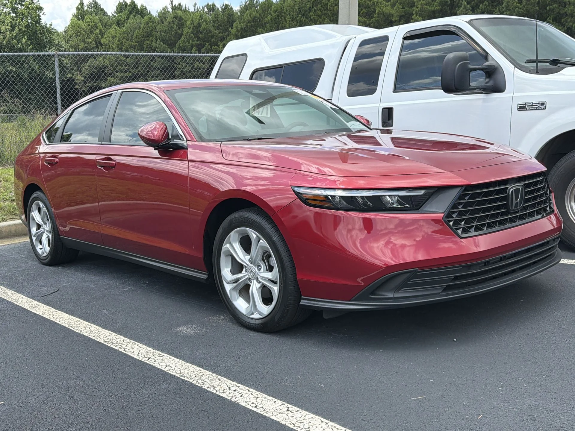 Used 2024 Radiant Red Metallic Honda LX image 1