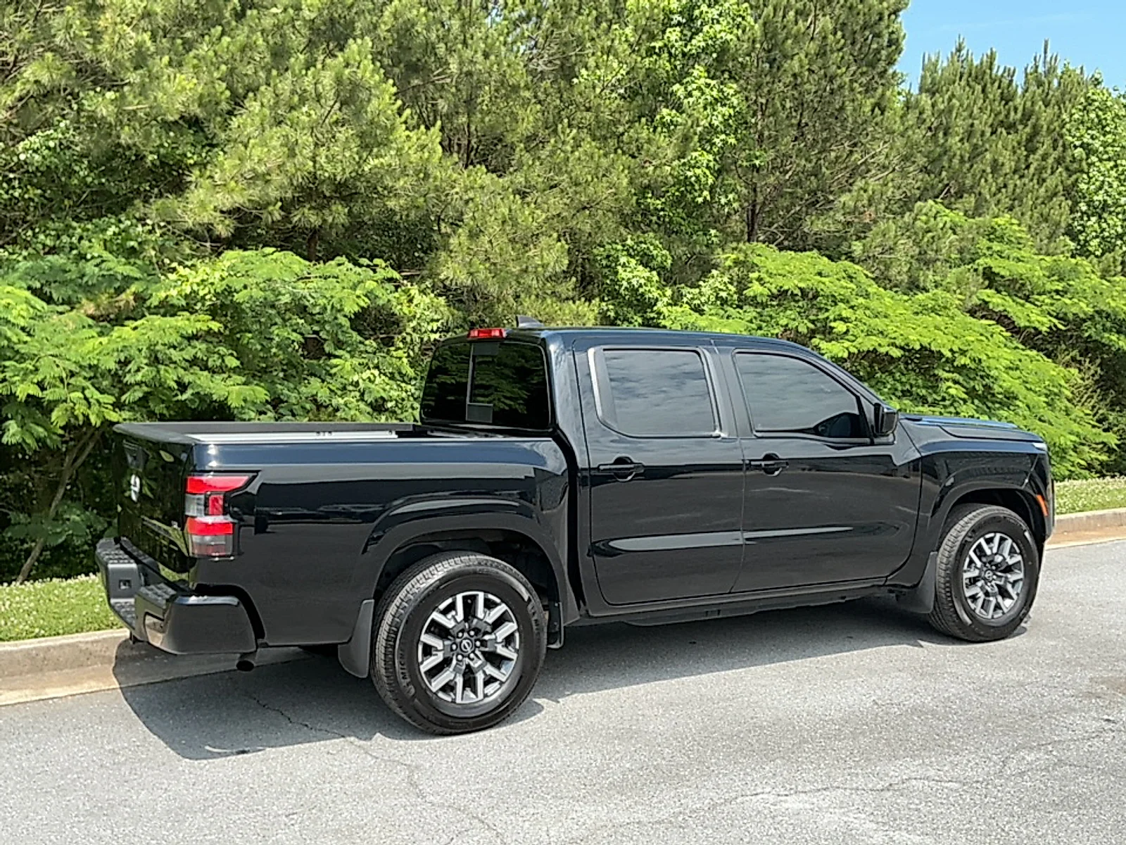 Used 2024 Super Black Nissan Crew Cab SL 4x2 image 2