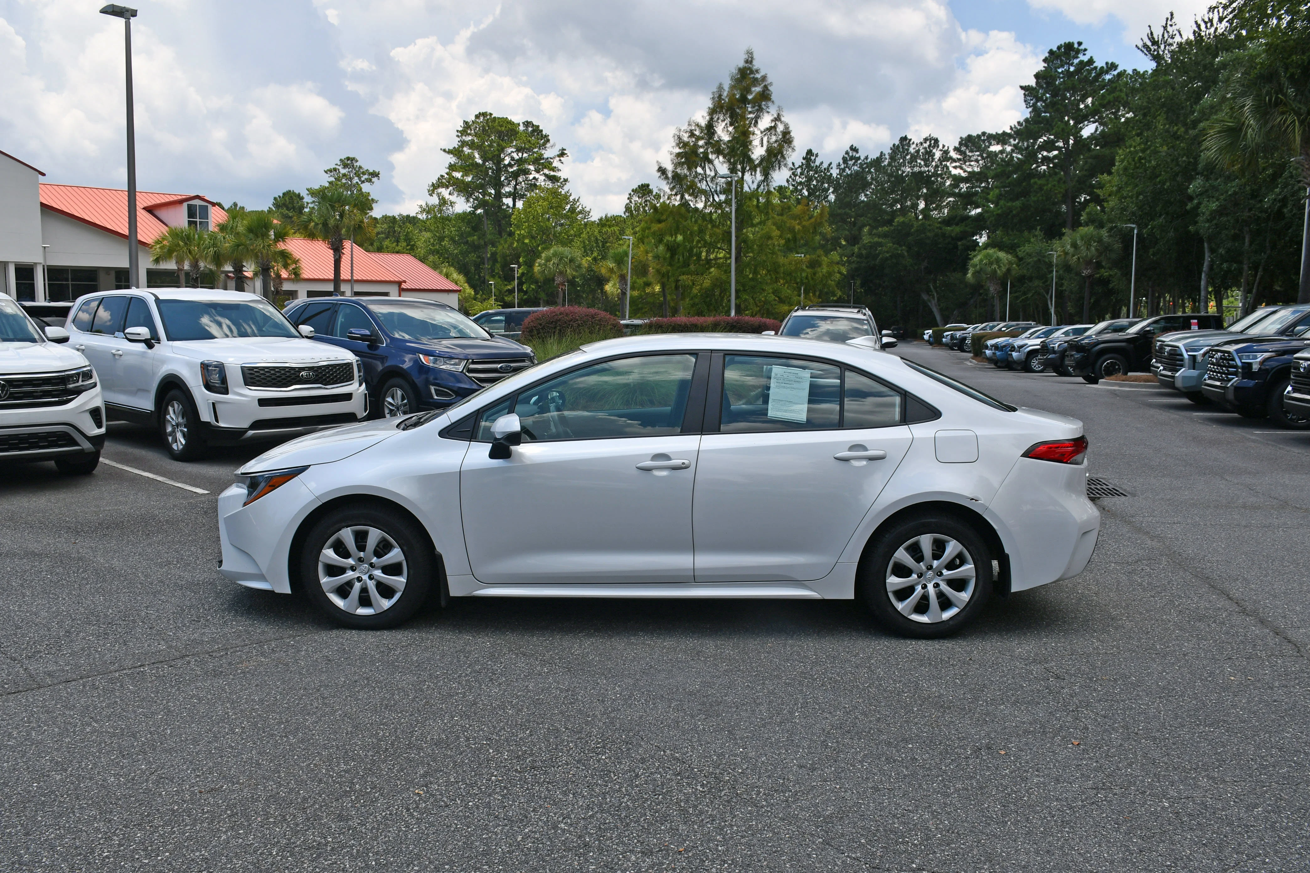 Certified Used 2025 Beige Toyota LE image 2