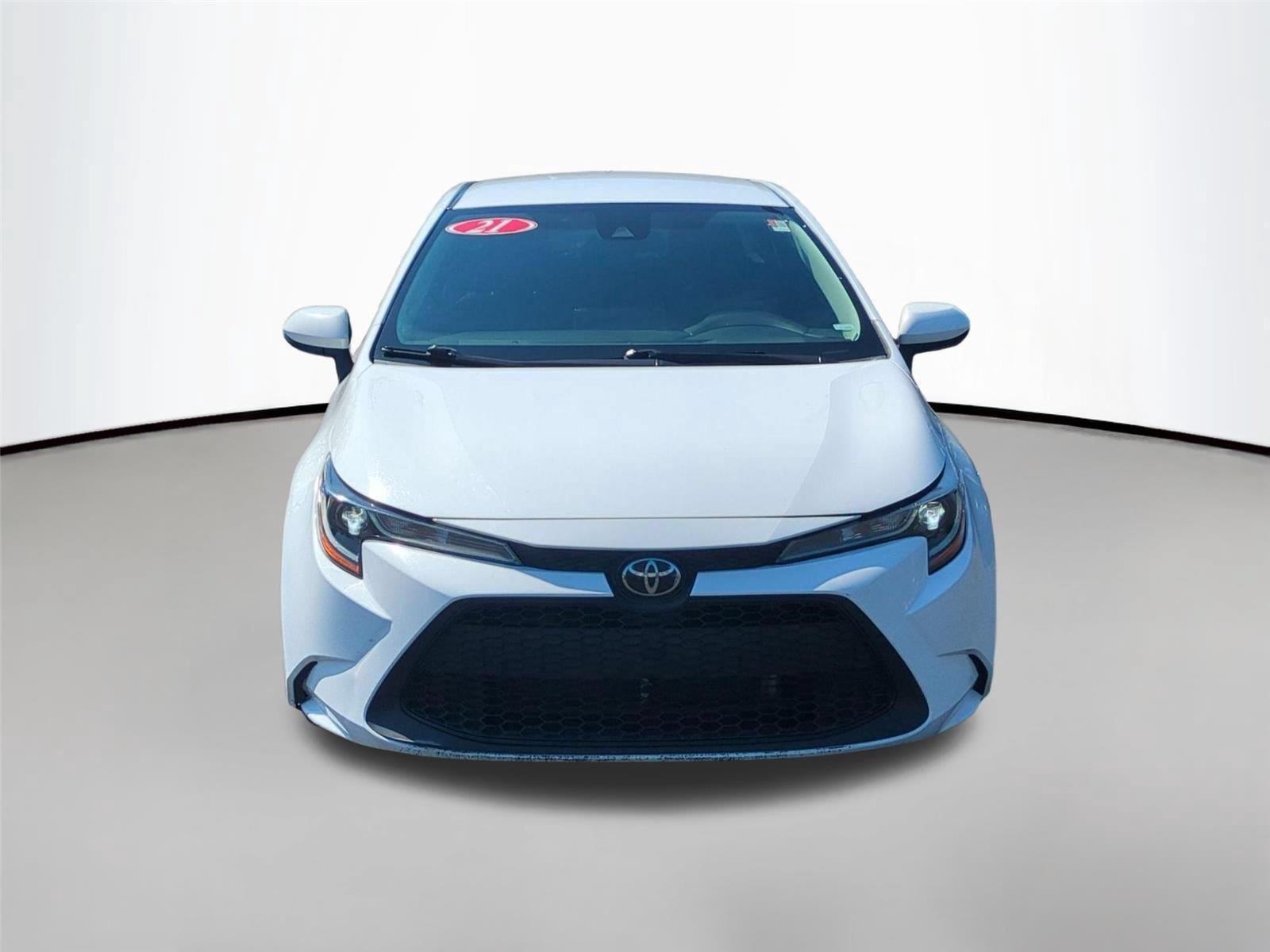 Used 2021 Super White Toyota LE image 8