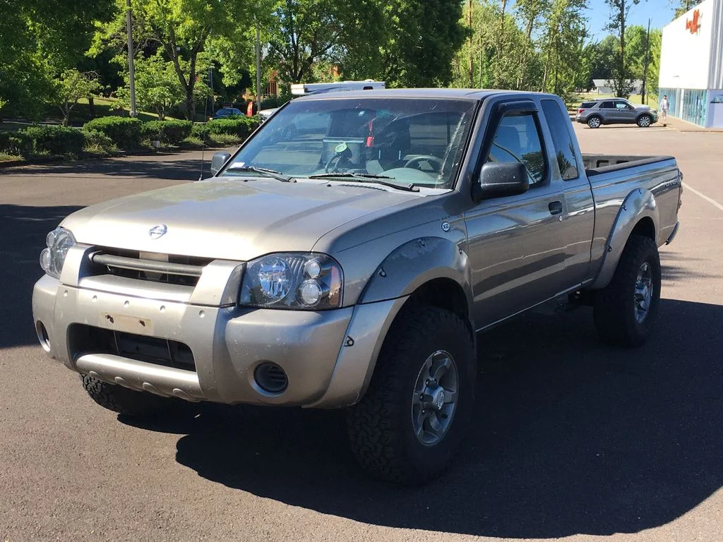 2003 Nissan Frontier XE King Cab V6 Desert Runner MT's photo