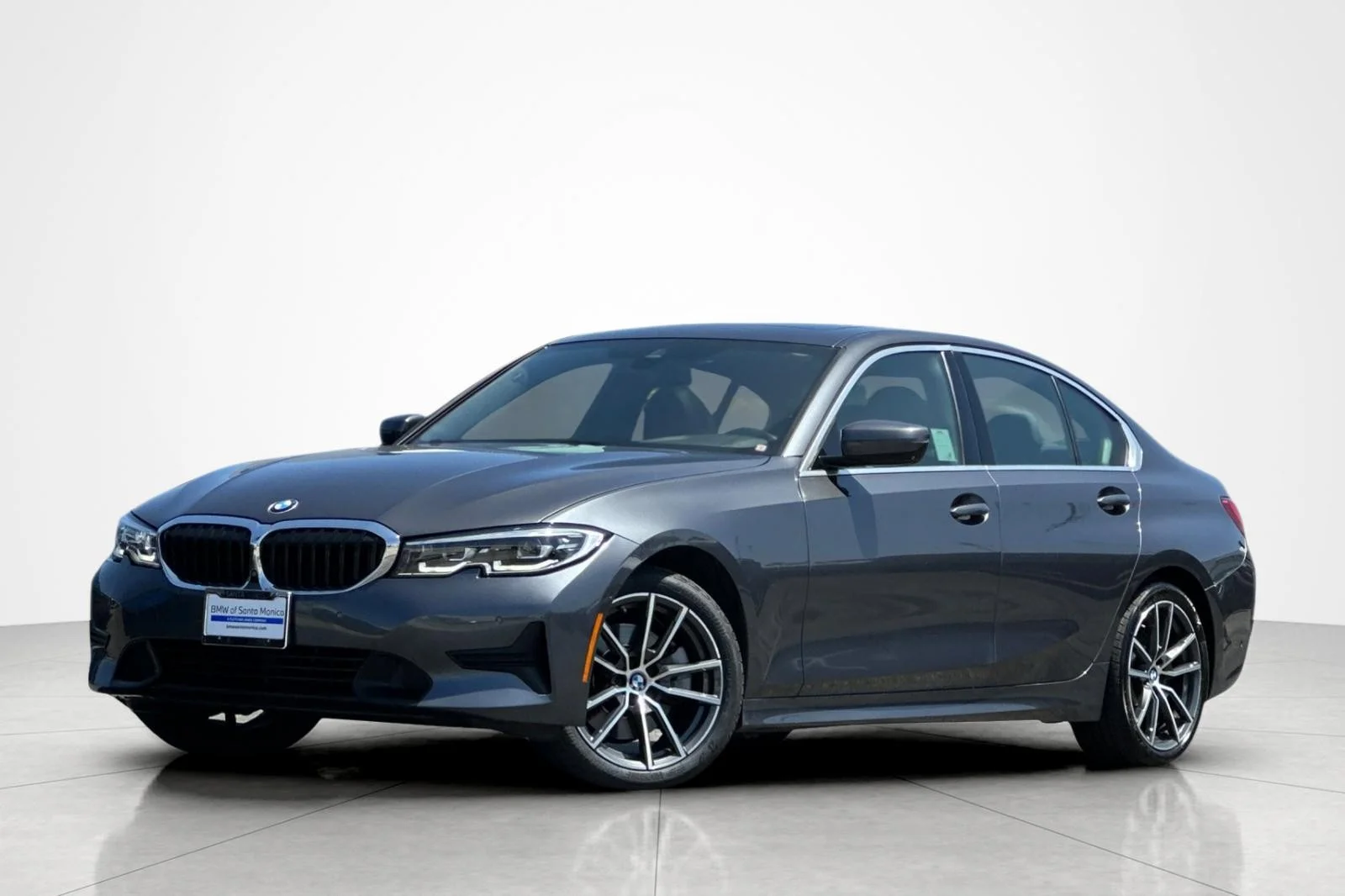 Used 2021 Mineral Gray Metallic BMW 330i image 1
