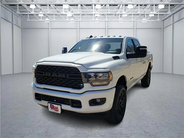 Used 2024 Bright White Clearcoat RAM Big Horn 4x4 Crew Cab 6.3 ft. box 149 in. WB image 1
