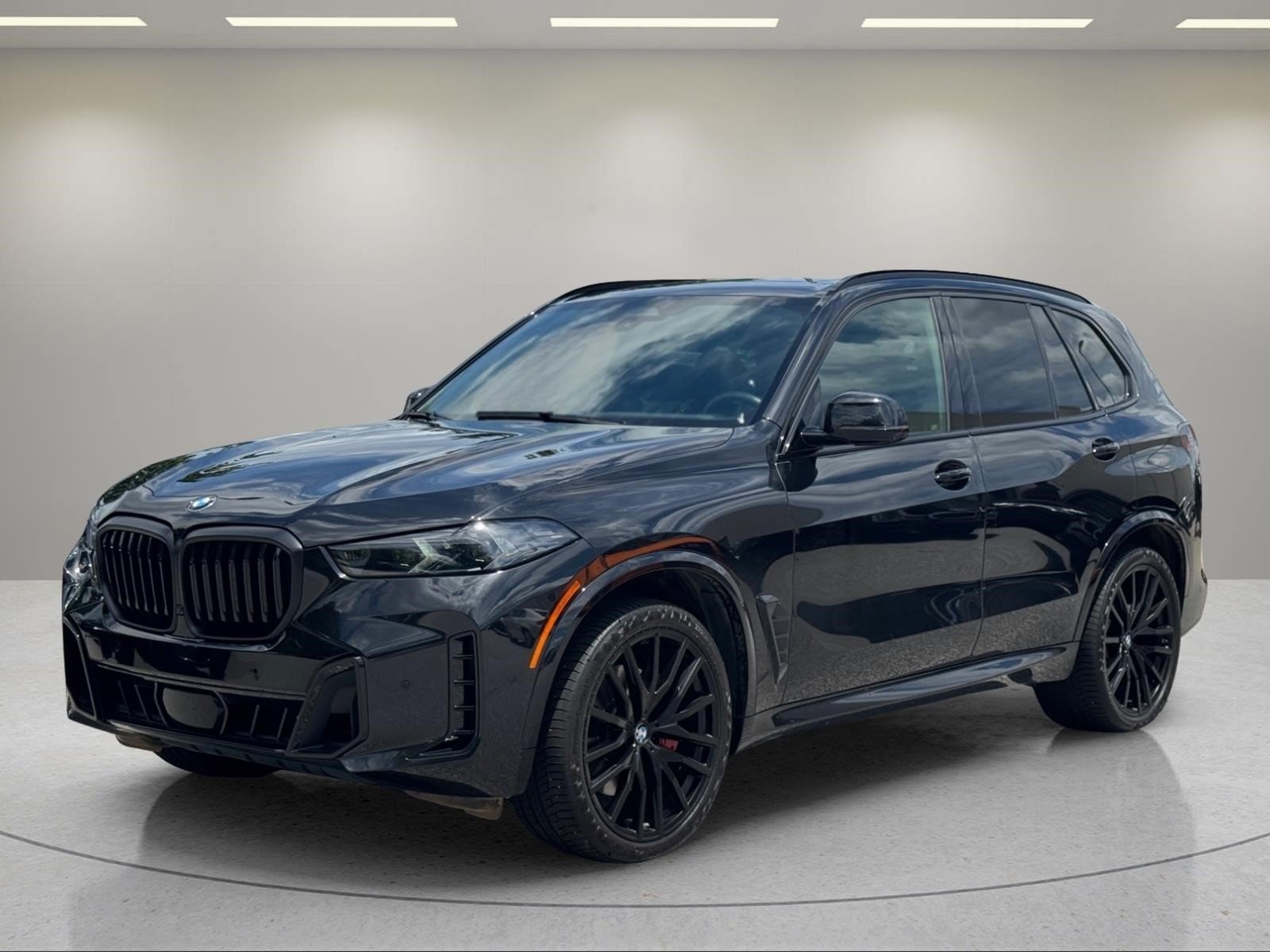 Used 2024 Black Sapphire Metallic BMW sDrive40i image 1