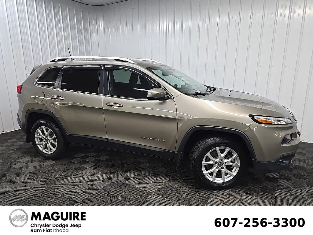 Used 2016 Beige Jeep Latitude image 1