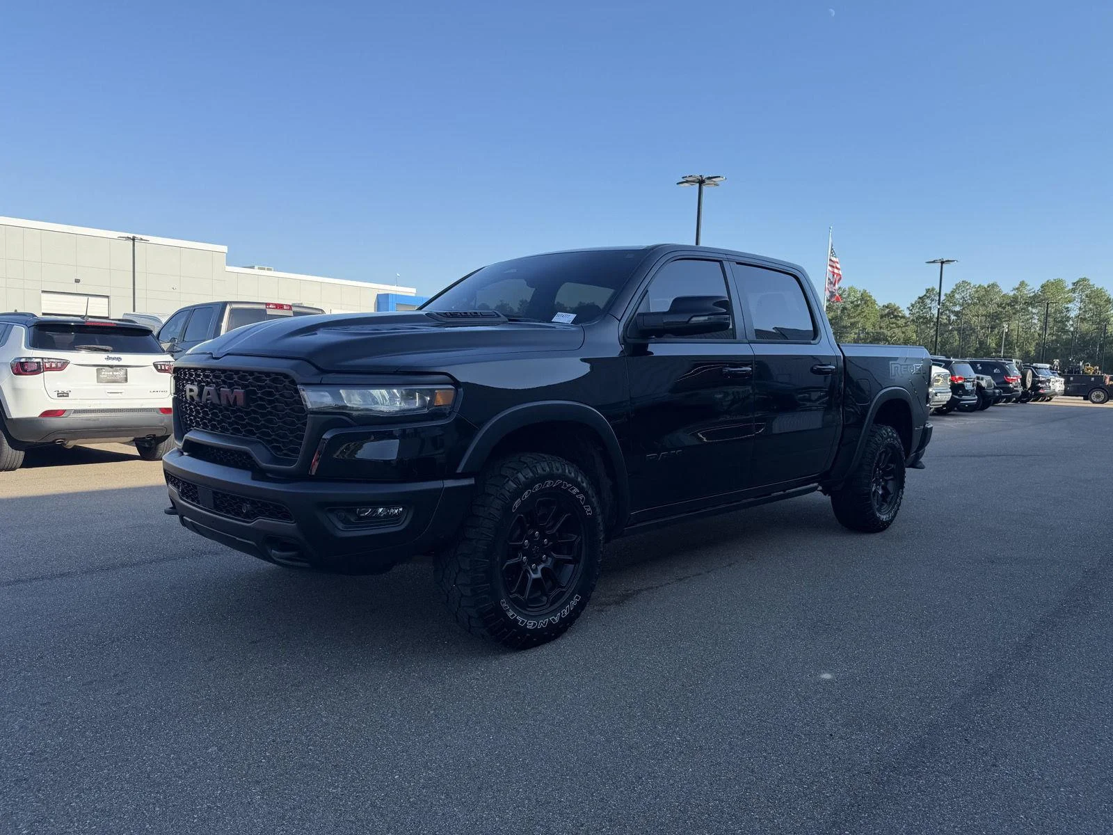 Used 2025 Diamond Black Crystal Pearlcoat Ram Rebel image 1