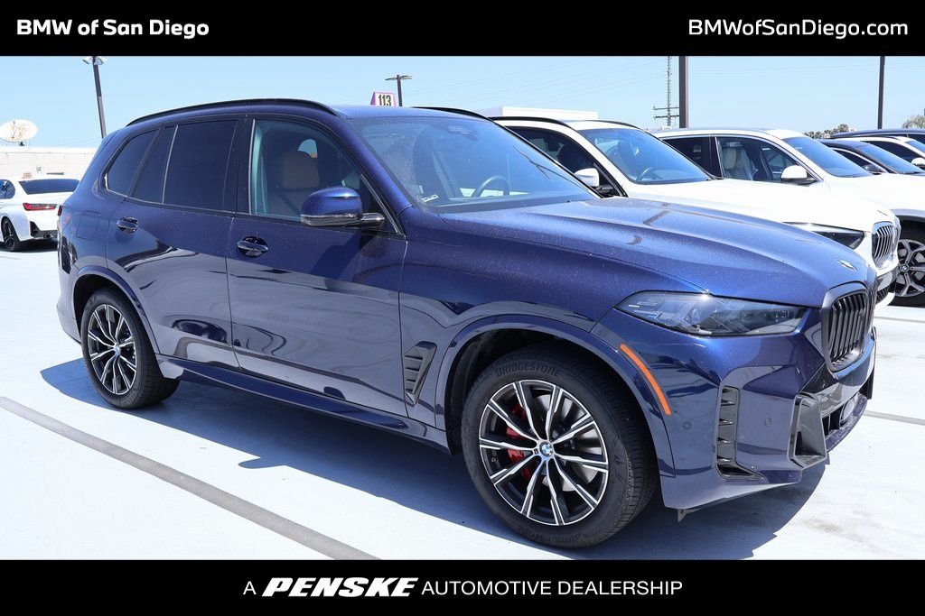 Certified Used 2025 Tanzanite Blue II Metallic BMW xDrive40i image 1