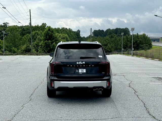 Certified Used 2025 Black Kia SX-Prestige image 4