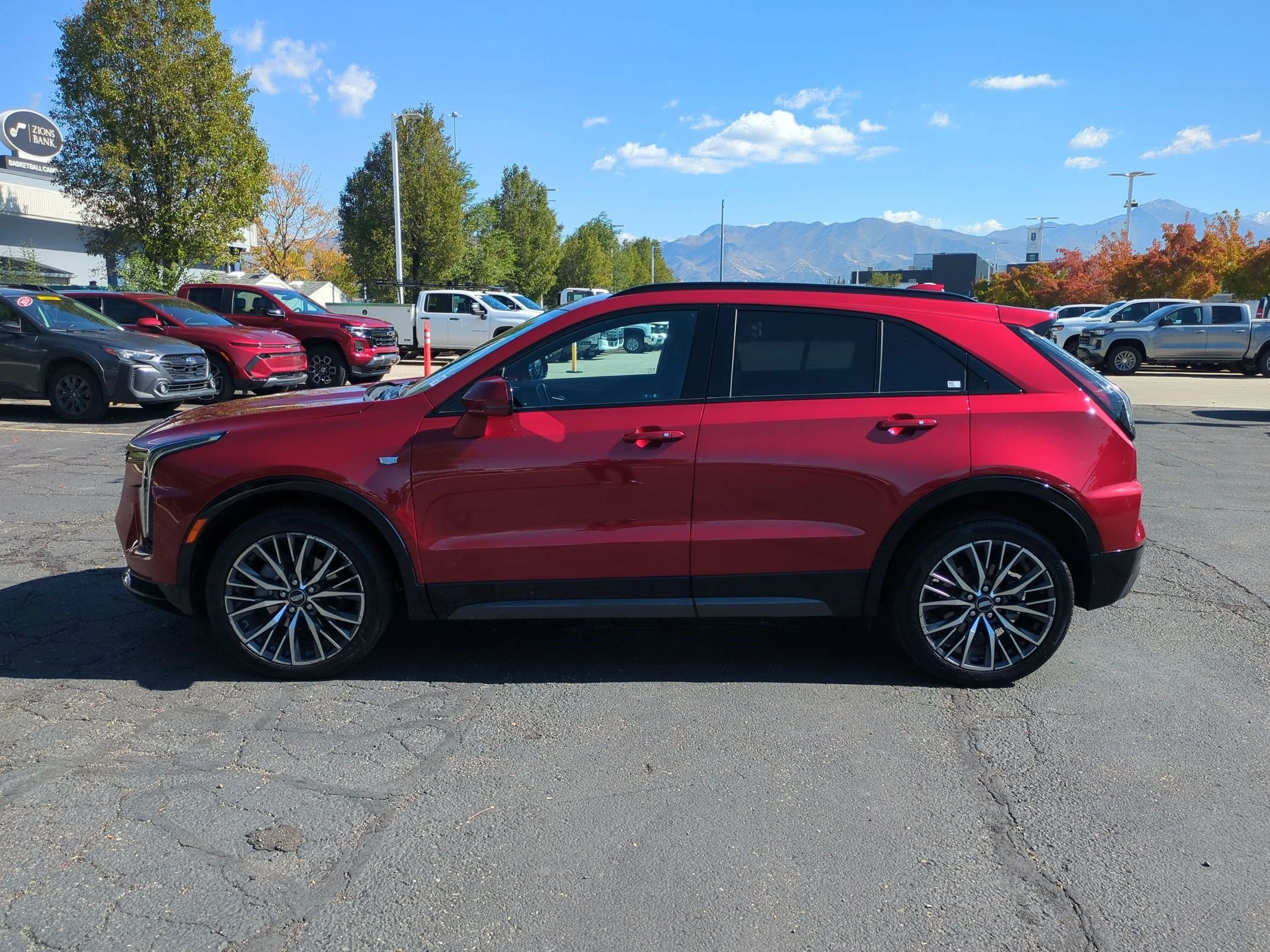 Used 2024 Radiant Red Tintcoat Cadillac AWD Sport image 2