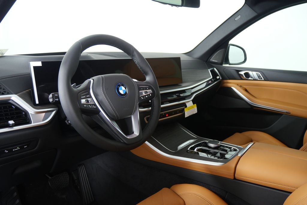 Used 2026 Mineral White Metallic BMW xDrive50e image 13