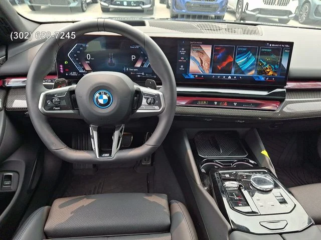Used 2026 Black Sapphire Metallic BMW 550e xDrive image 10