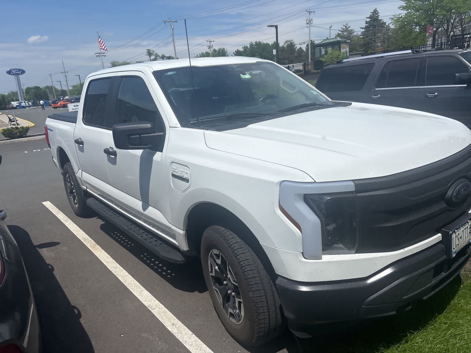 Used 2023 Ford F-150 Lightning Pro with VIN 1FTVW1EL5PWG18306 for sale in Latham, NY