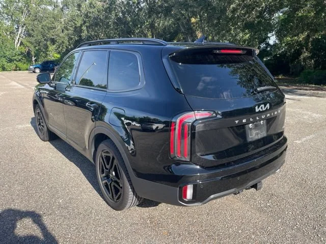 Used 2024 Ebony Black Kia SX Prestige X-Line image 4
