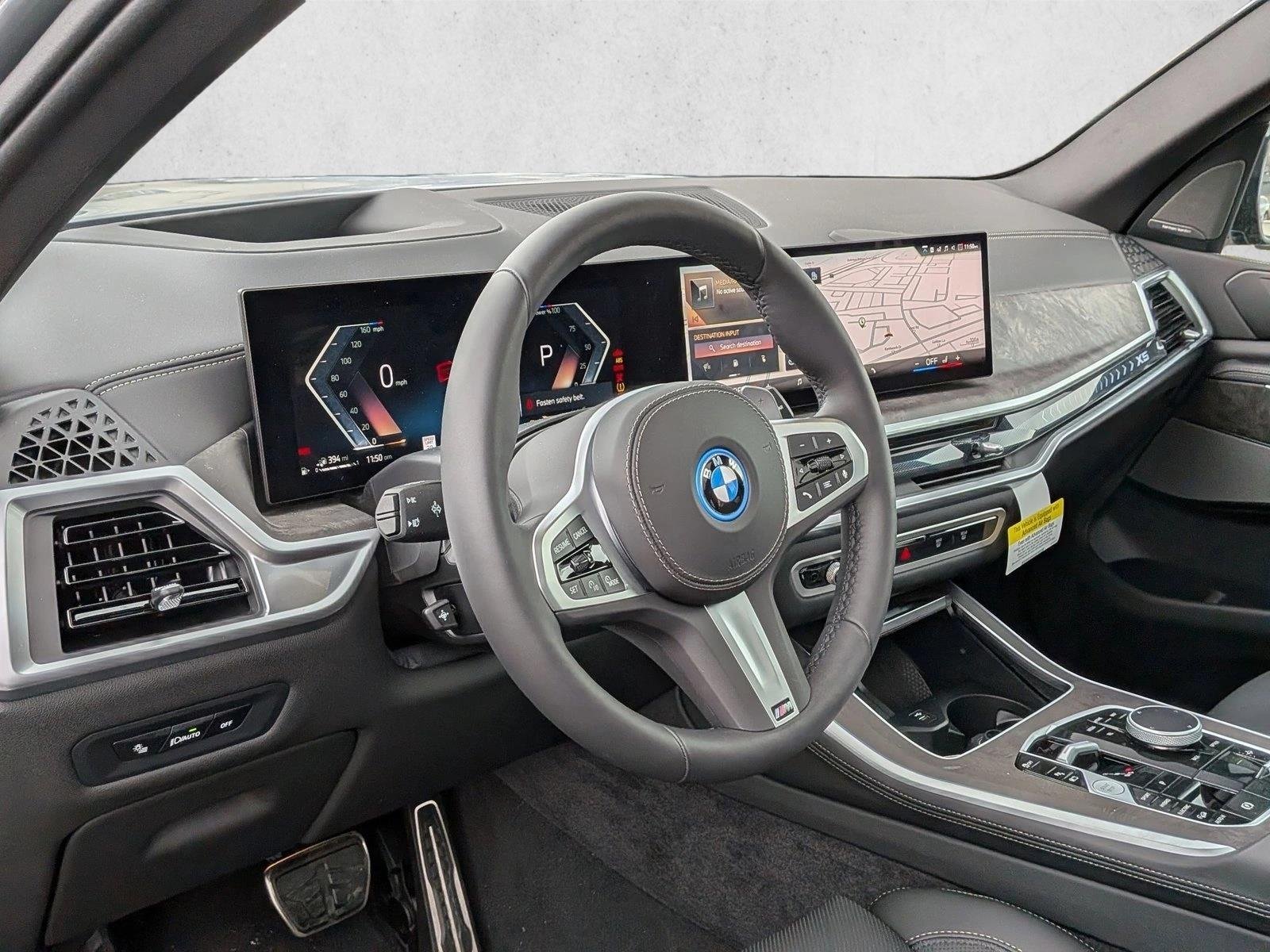 Used 2026 Skyscraper Grey Metallic BMW xDrive50e image 3