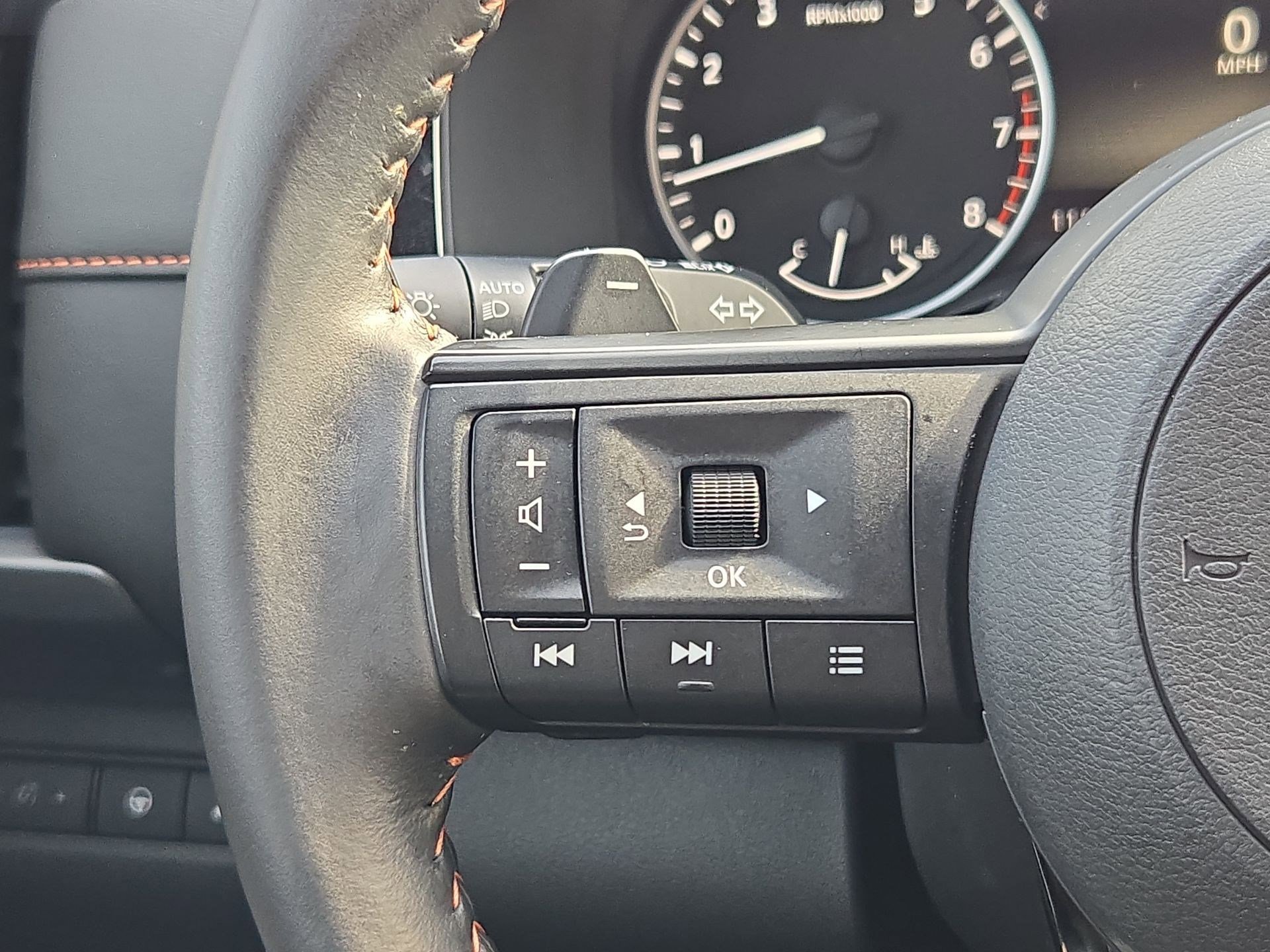 Used 2025 Solid Gray/Super Black Nissan Rock Creek image 17