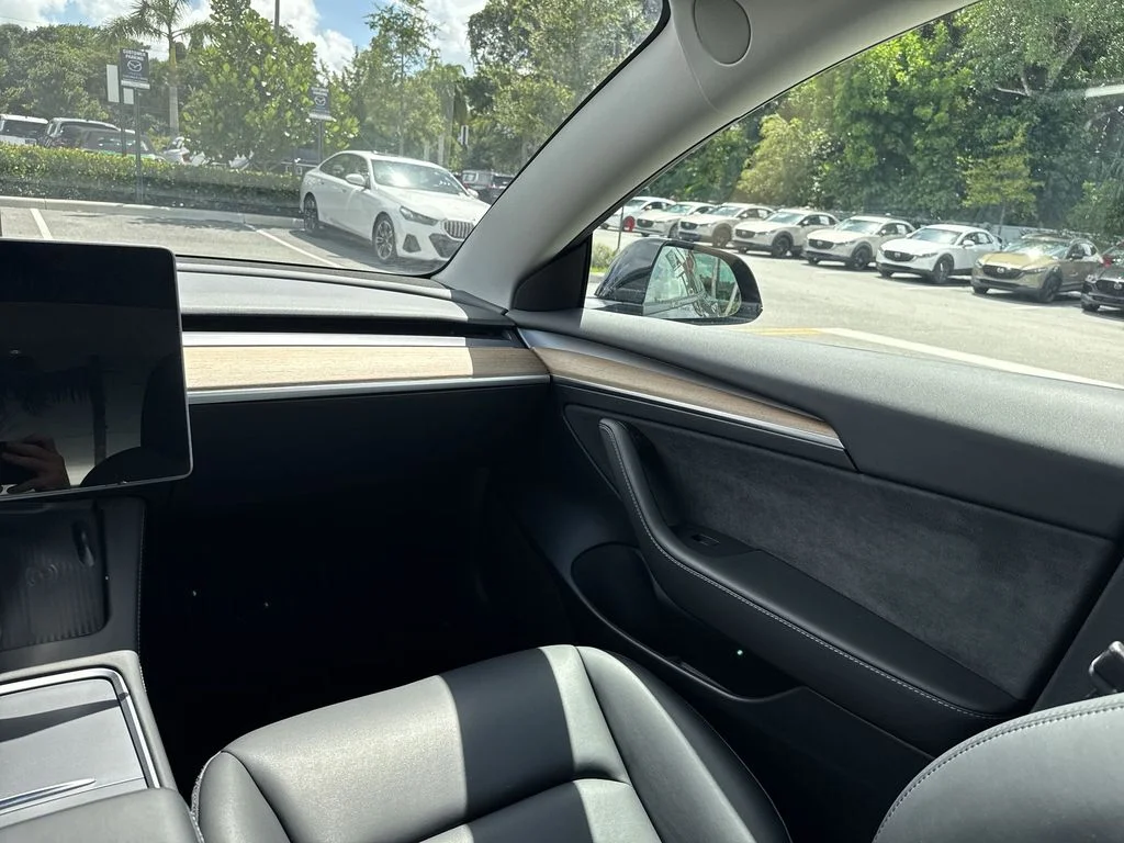 Used 2023 Solid Black Tesla  image 15