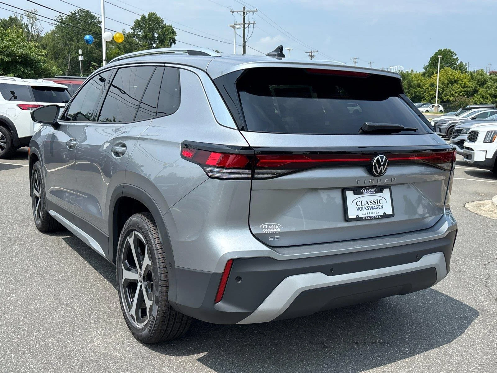 New 2026 Pyrite Silver Metallic Volkswagen SE image 3