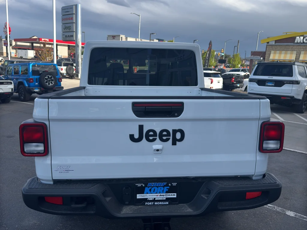 New 2026 Bright White Clear-Coat Exterior Paint Jeep Sport S image 4