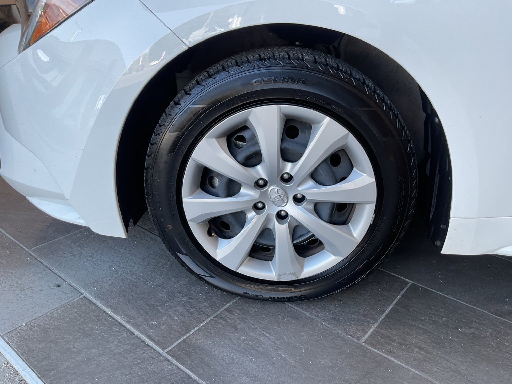 Used 2025 White Toyota LE image 4