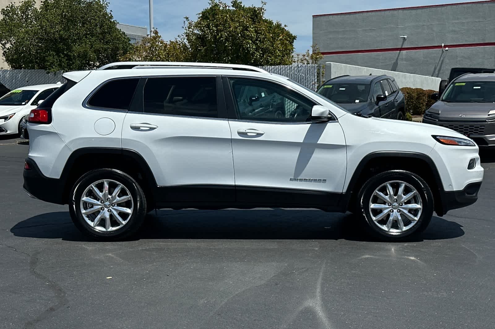 Used 2016 Bright White Clearcoat Jeep Limited image 6