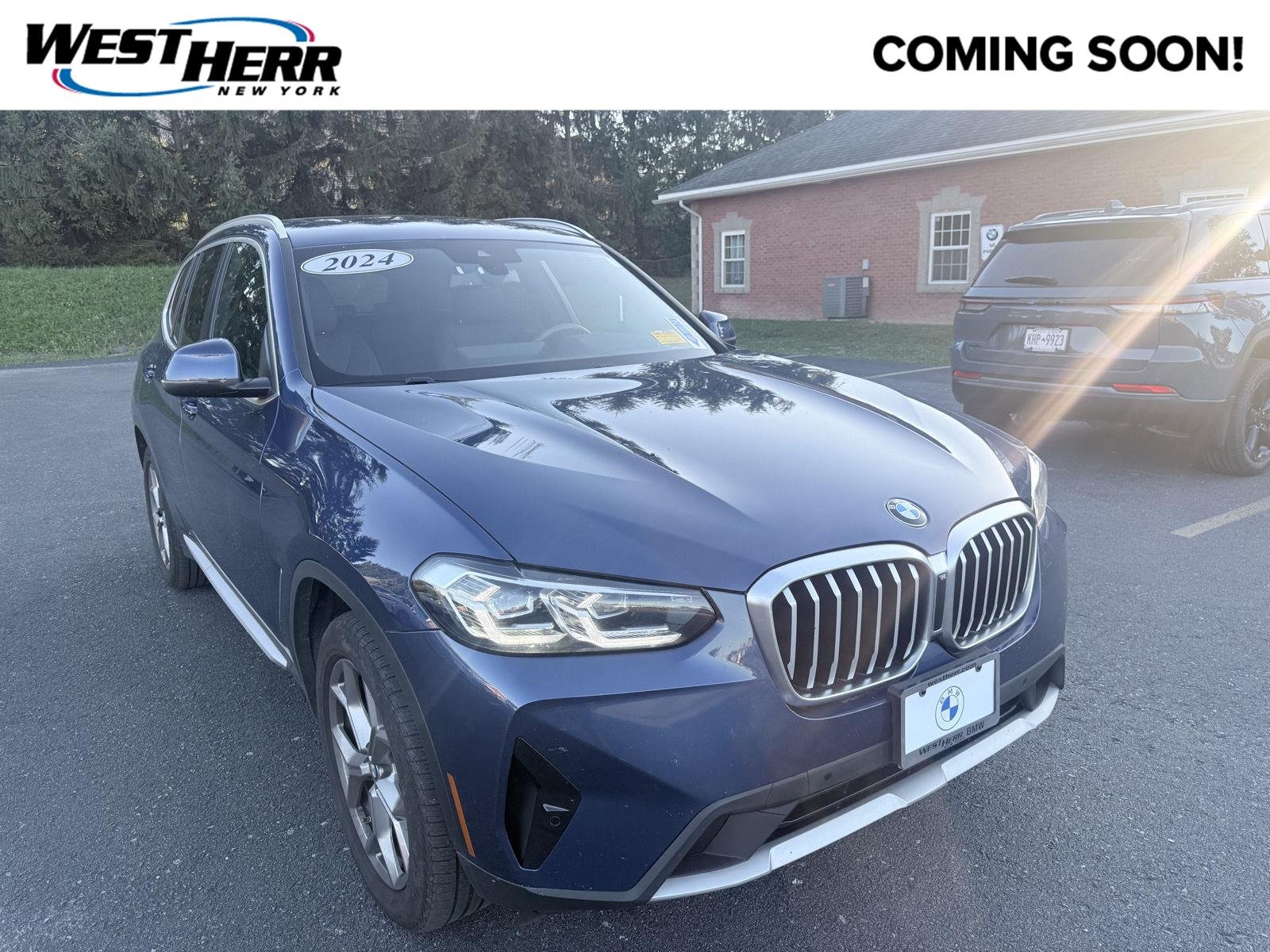 Used 2024 Phytonic Blue Metallic BMW xDrive30i image 1