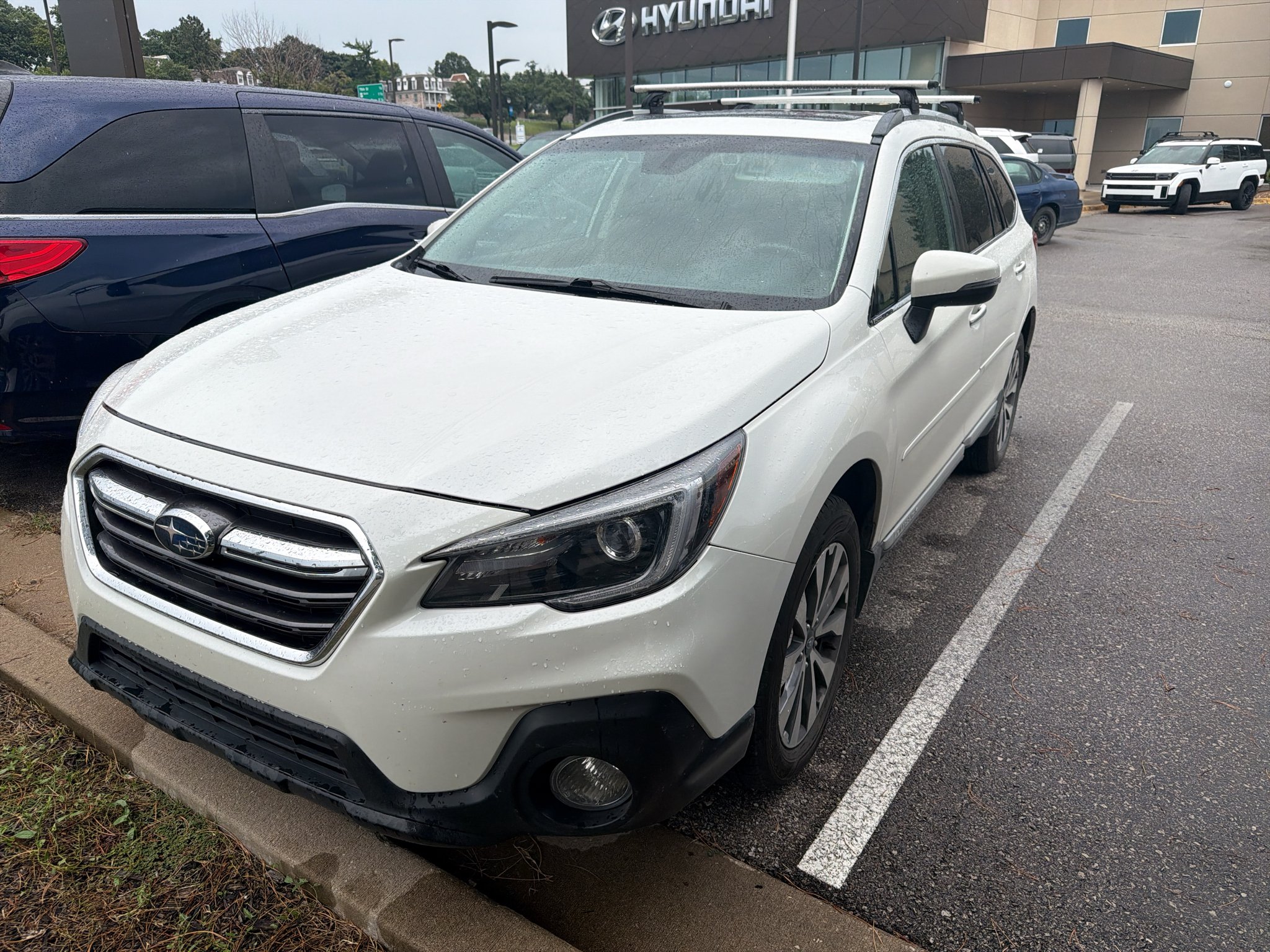 Used 2018 Crystal White Pearl Subaru Touring image 1