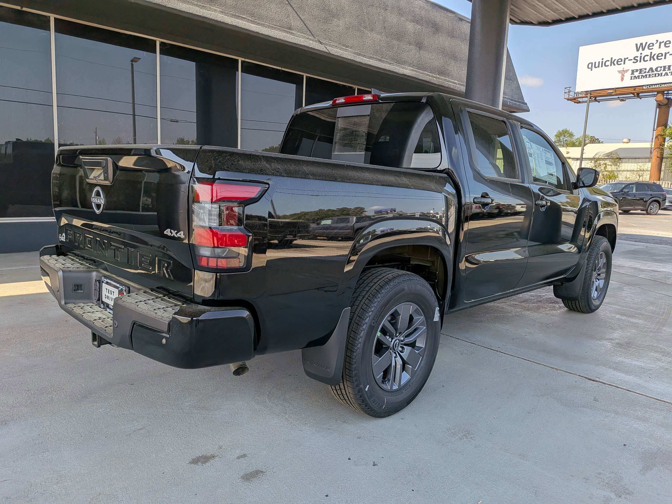 New 2026 Super Black Nissan Crew Cab SV image 3