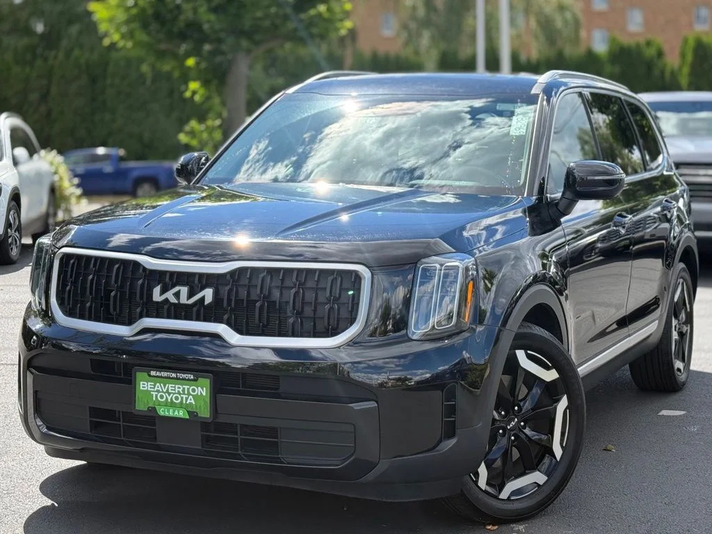 Used 2024 Black Kia EX image 1