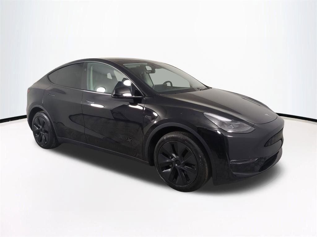 Used 2024 Tesla Model Y Long Range with VIN 7SAYGDEEXRA302288 for sale in Tampa, FL