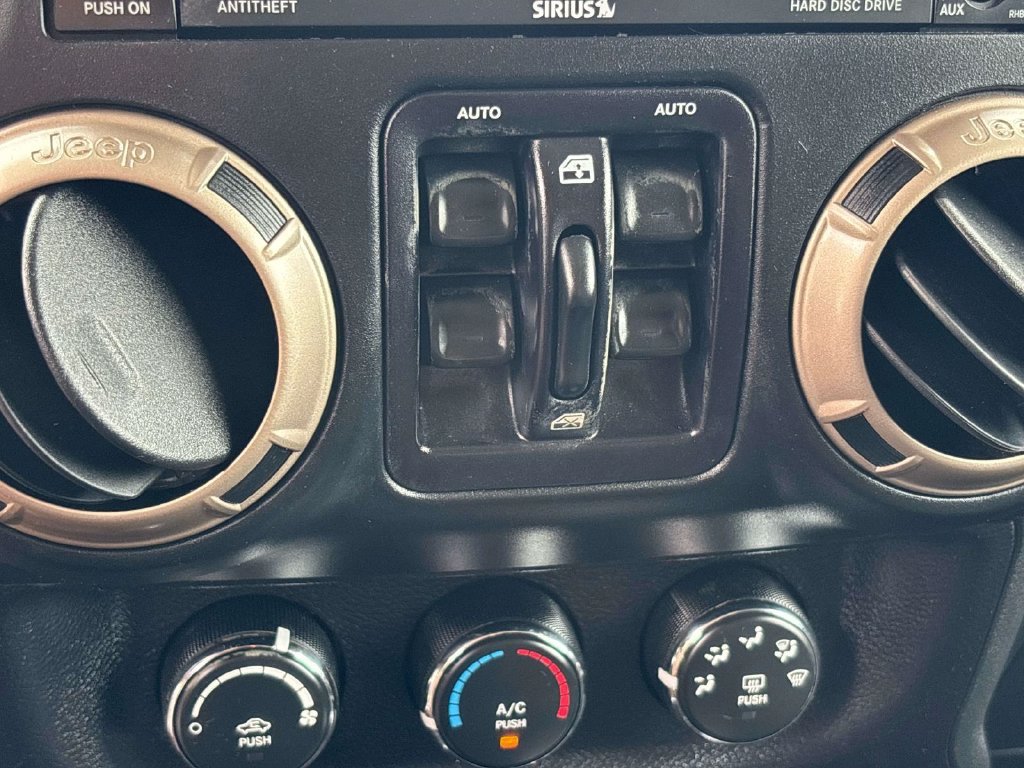 Used 2016 Black Jeep Unlimited Sahara image 20