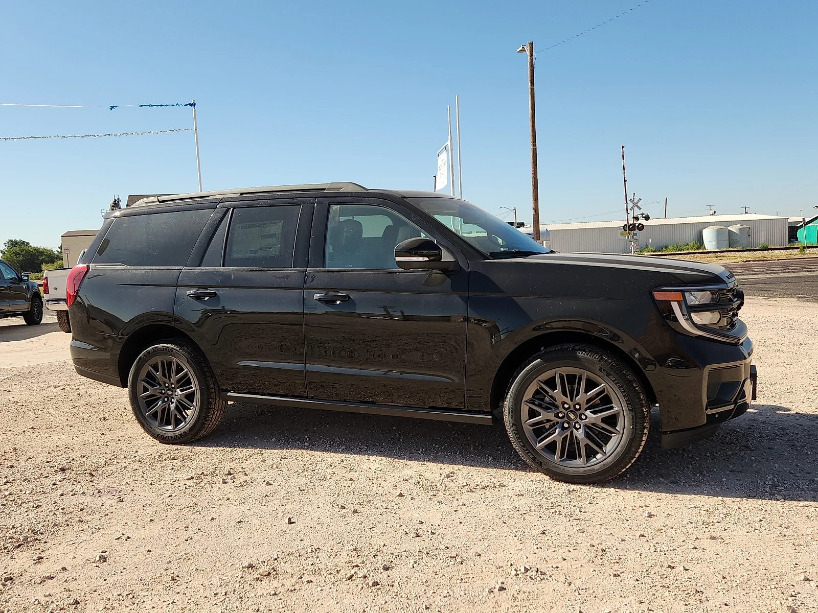 New 2027 Agate Black Metallic Ford Platinum image 8