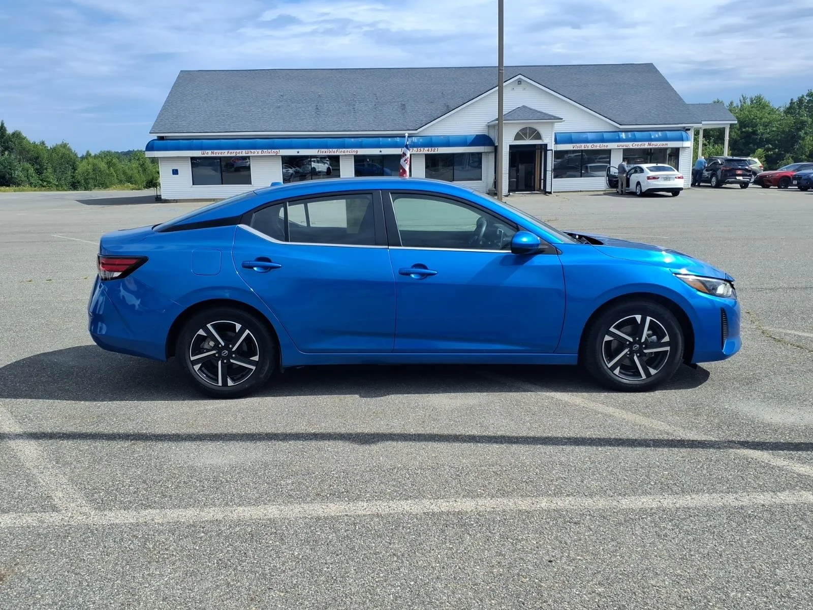 Used 2025 Electric Blue Metallic Nissan SV image 4