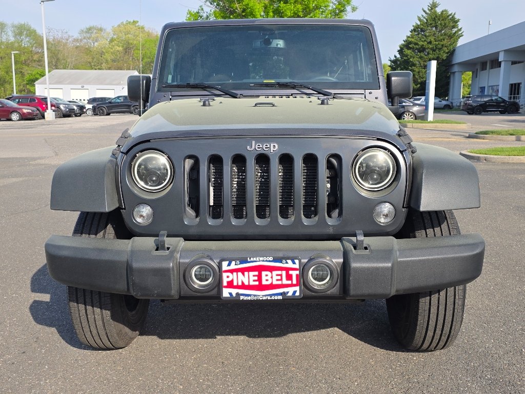 Used 2016 Granite Crystal Metallic Clear Coat Jeep Sport image 10