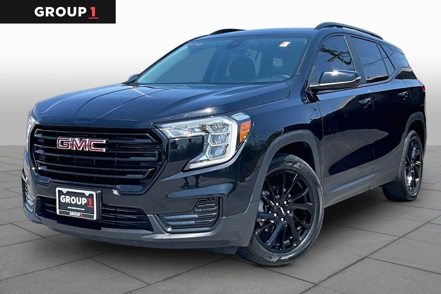 Used 2024 Ebony Twilight Metallic GMC SLE image 1