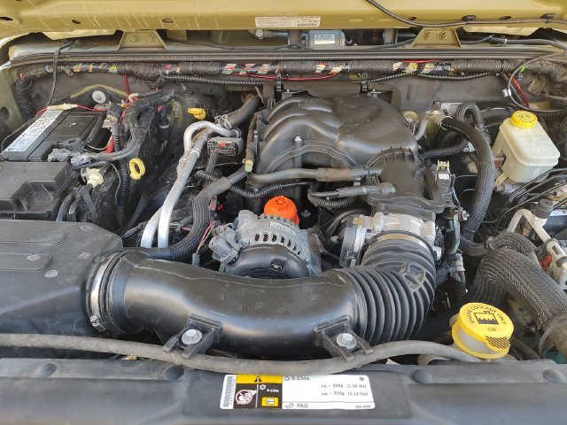 Used 2013 Green Jeep Unlimited Sport image 28
