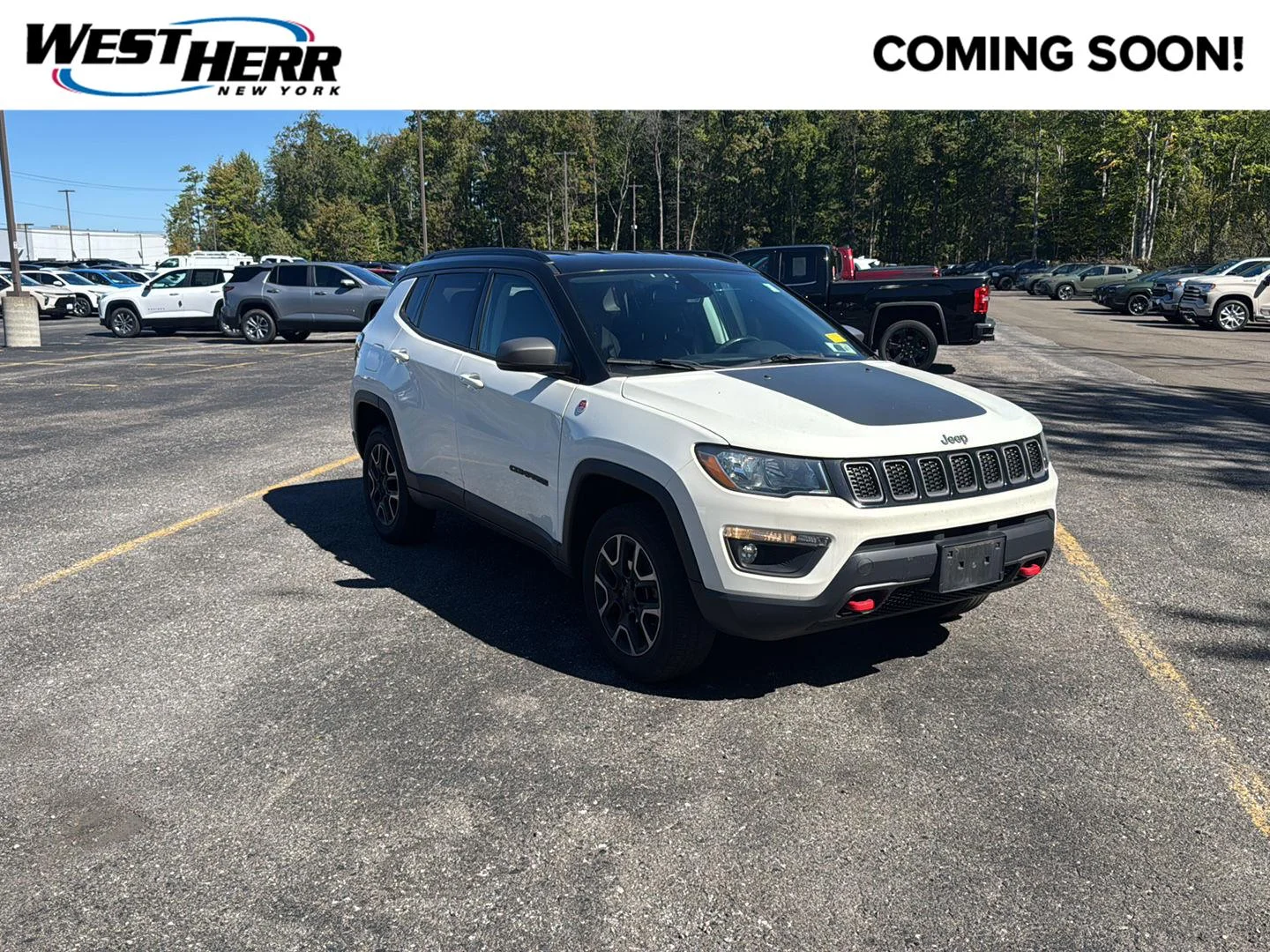 Used 2019 White Clearcoat Jeep Trailhawk image 1