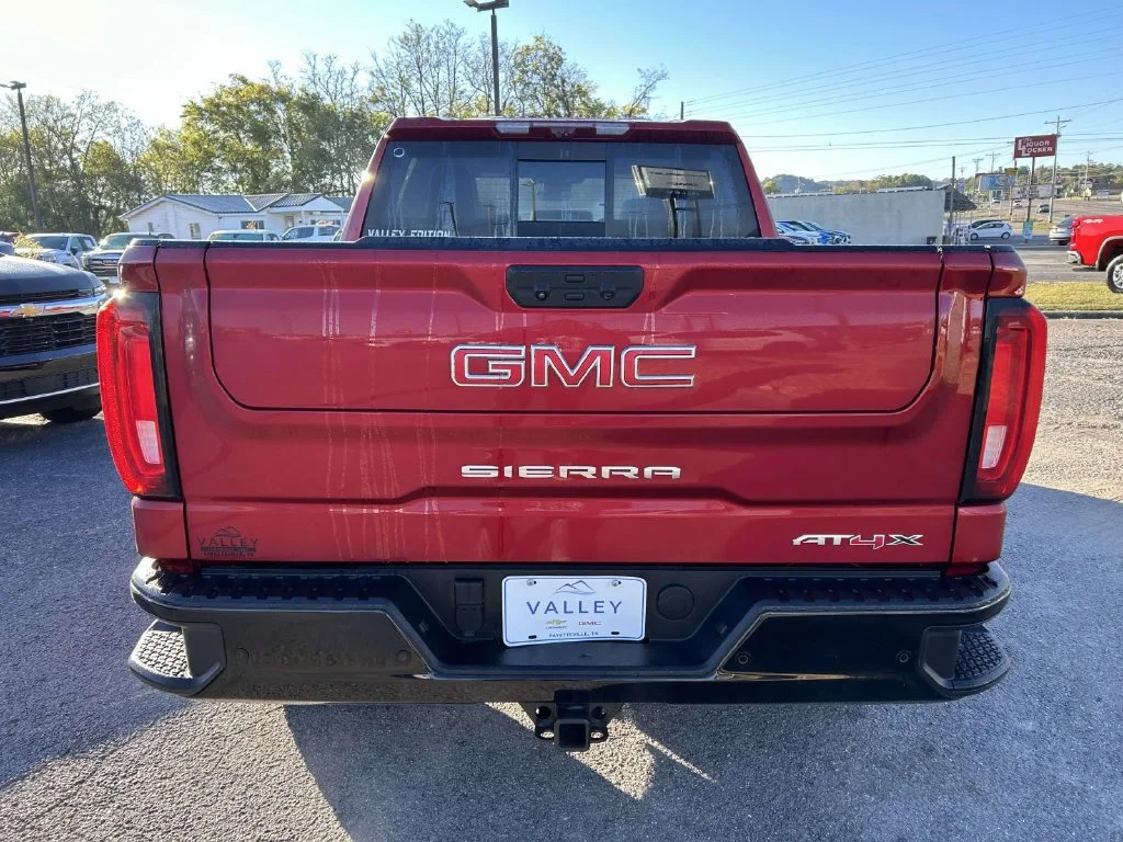New 2026 VOLCANIC RED TINTCOAT GMC AT4X image 5