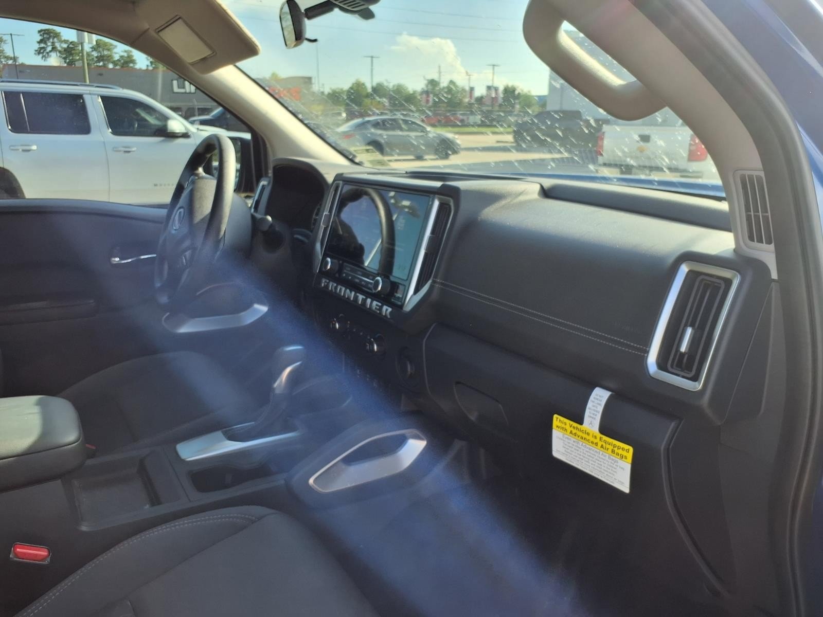 2026 Nissan Frontier SV Blue at Robbins Nissan