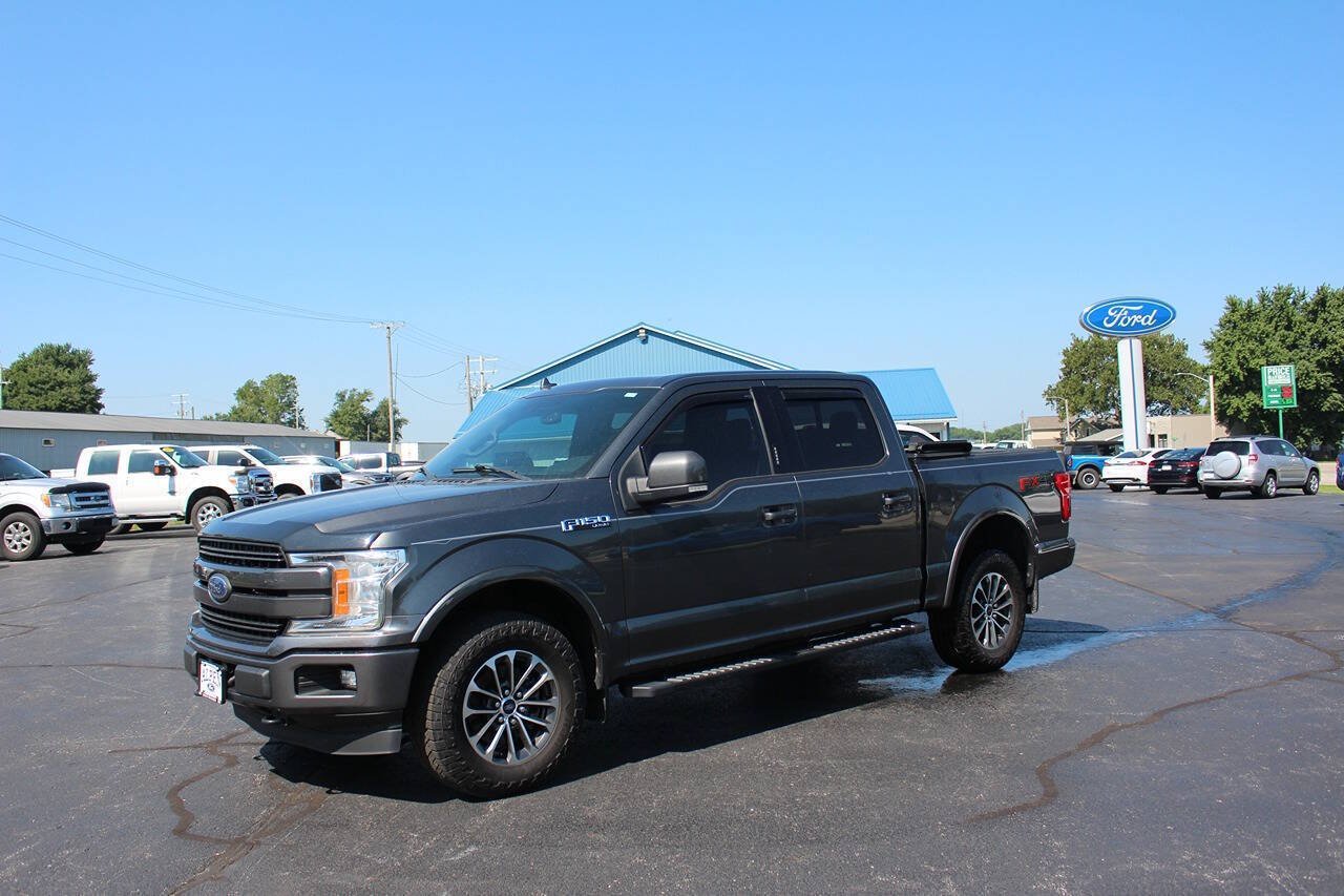 Used 2018 Magnetic Ford Lariat 4x4 4dr SuperCrew 5.5 ft. SB image 1