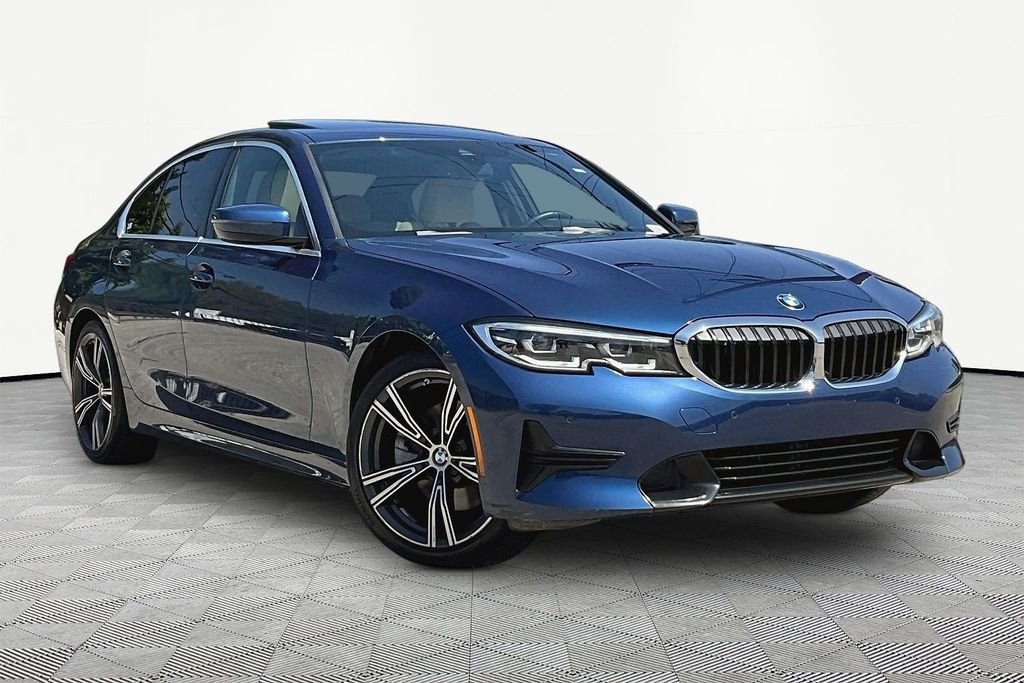 Used 2021 Blue BMW 330i image 1
