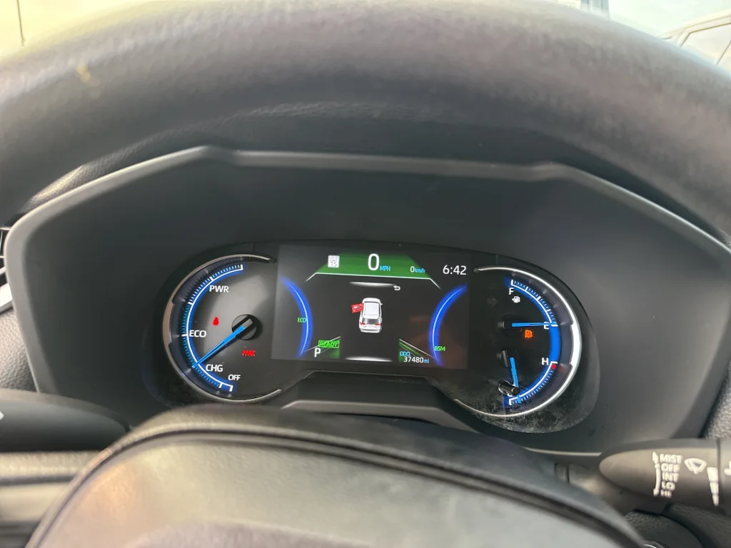 Used 2025 Midnight Black Metallic Toyota Hybrid XLE image 5