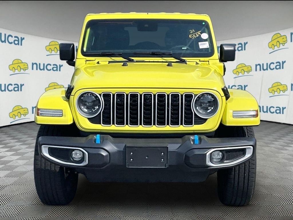 Used 2024 Yellow Jeep Sahara 4xe image 2
