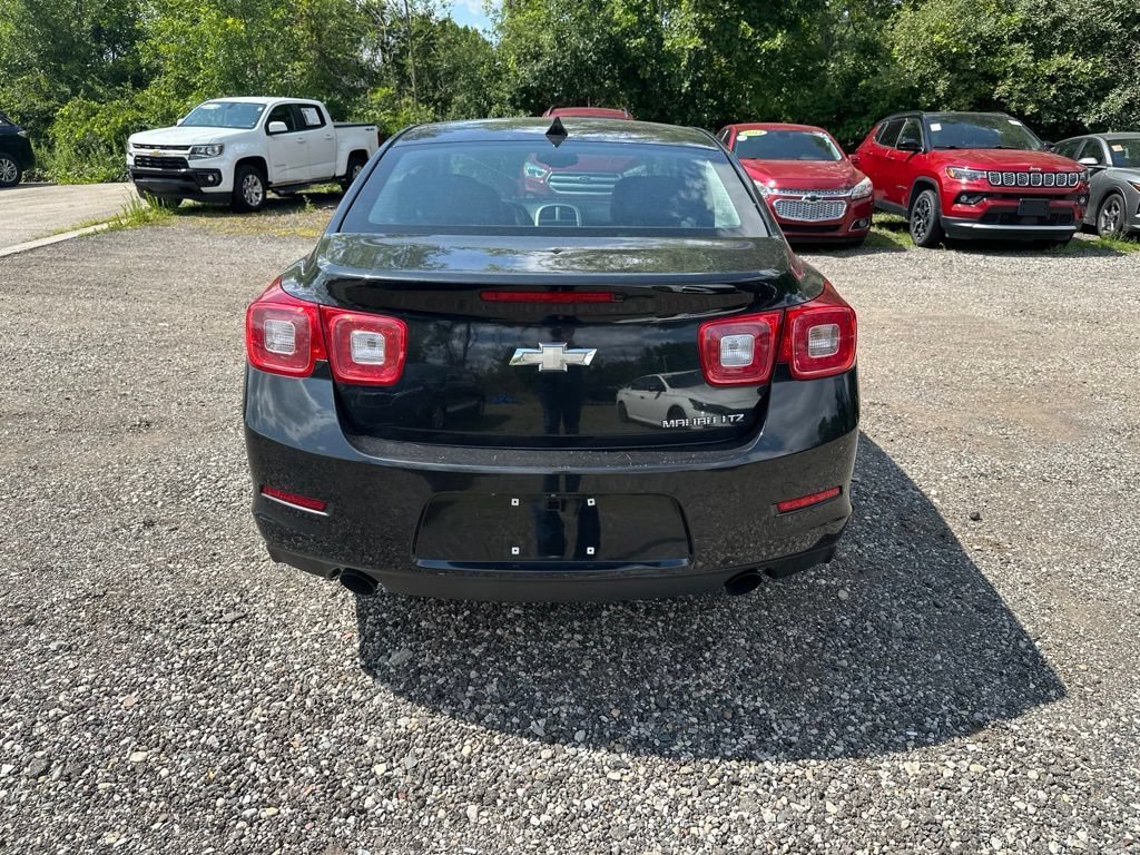 Used 2013 BLACK GRANITE METALLIC Chevrolet LTZ image 4